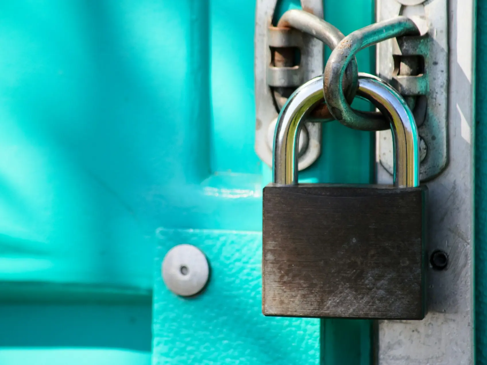 a close up of a padlock on a door