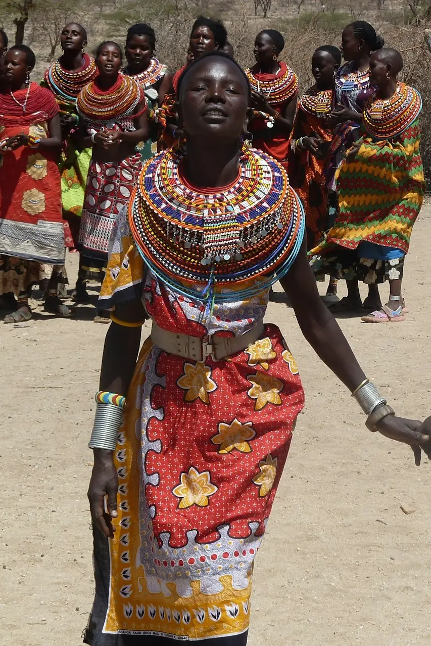 two women holding hands each other