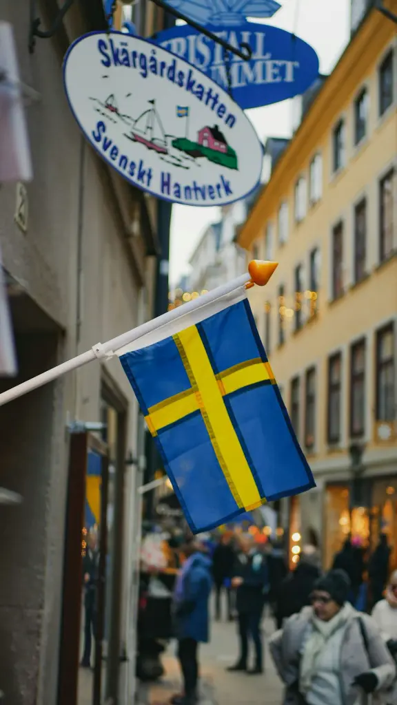 unsplash_6fDyJd45bq4_swedish flag.webp.jpg.jpg.jpg.jpg